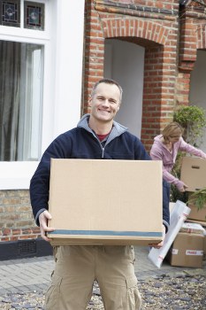 Moving van and boxes for a Surrey home removal