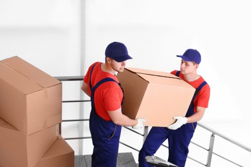 Moving van and boxes outside a Surrey home during a house move