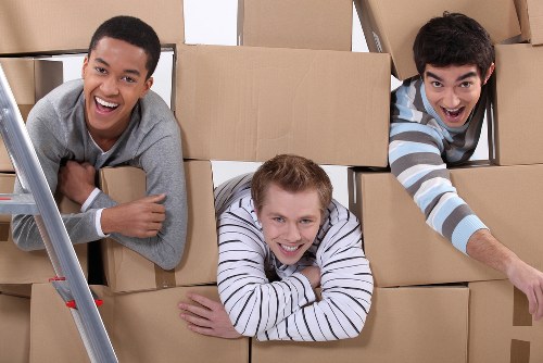 Commercial moving team loading office furniture in Surrey