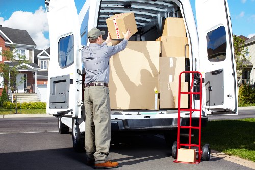 Moving team loading household items for a Surrey relocation