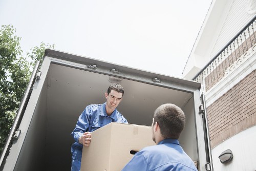 Unloading moving boxes into a new Surrey home