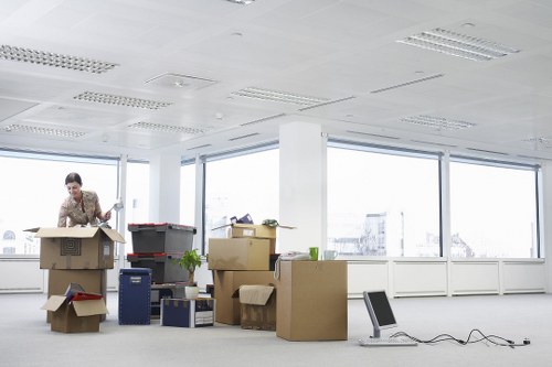 Furniture being carried through a Surrey property during relocation