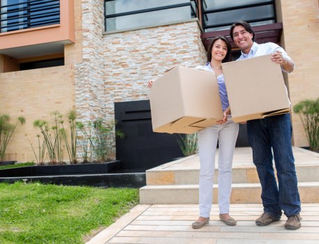 Local movers loading office items in a Surrey business district