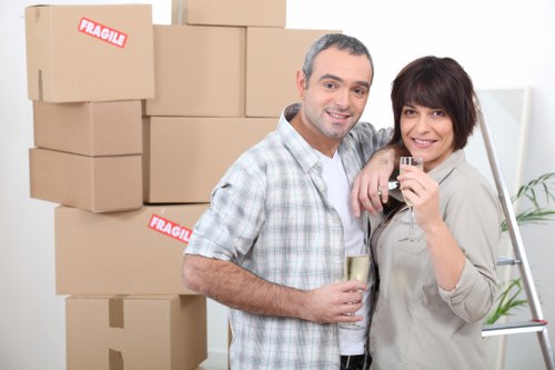 Removal crew loading boxes and household items for a Surrey relocation